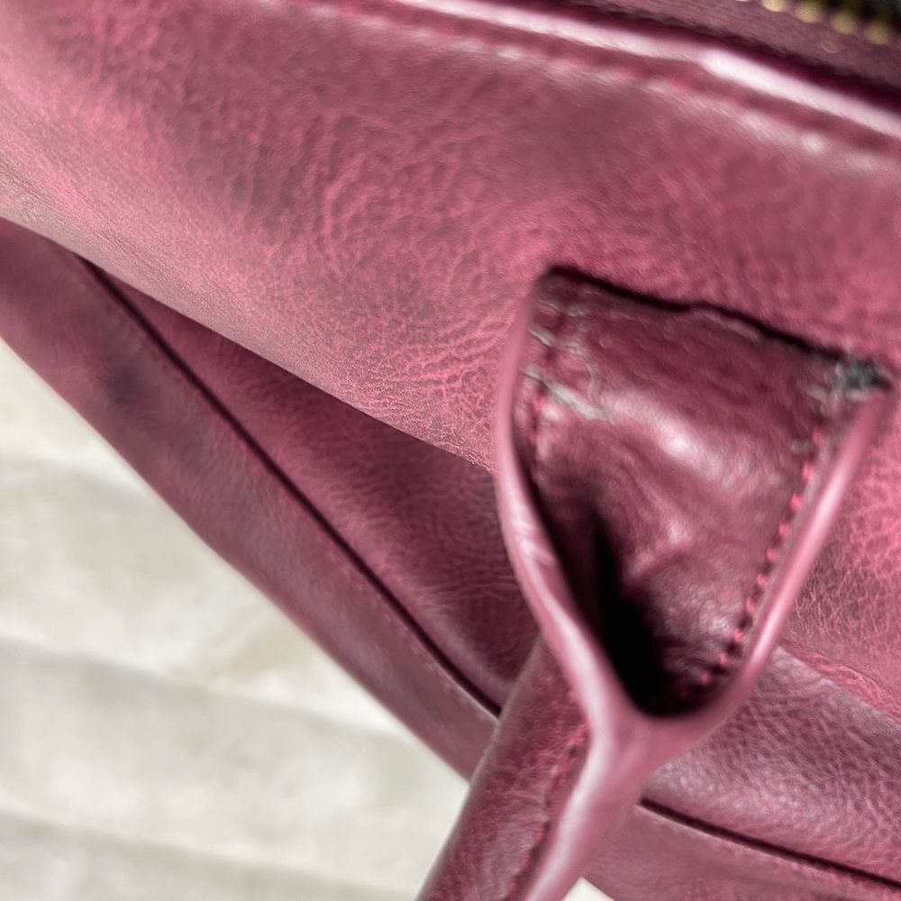 Steve Madden burgundy faux leather satchel with rustic studs accent. - Picture 16 of 16